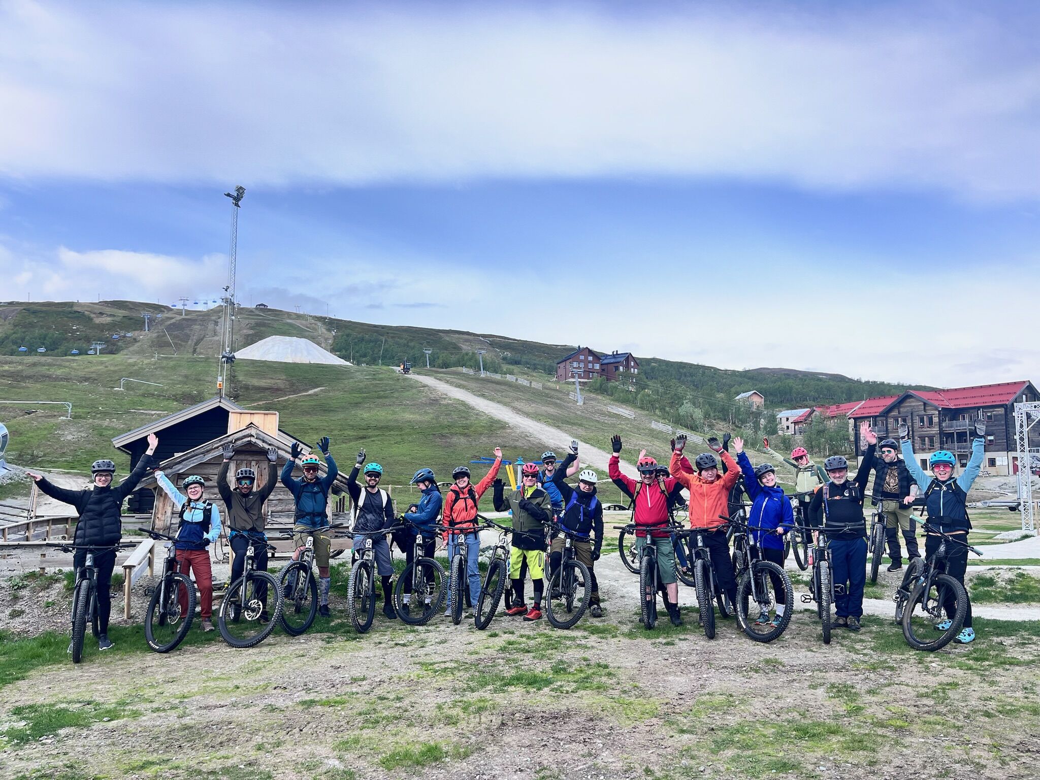 Group photo of Peer to Peer Participants ready to go mountainbiking.